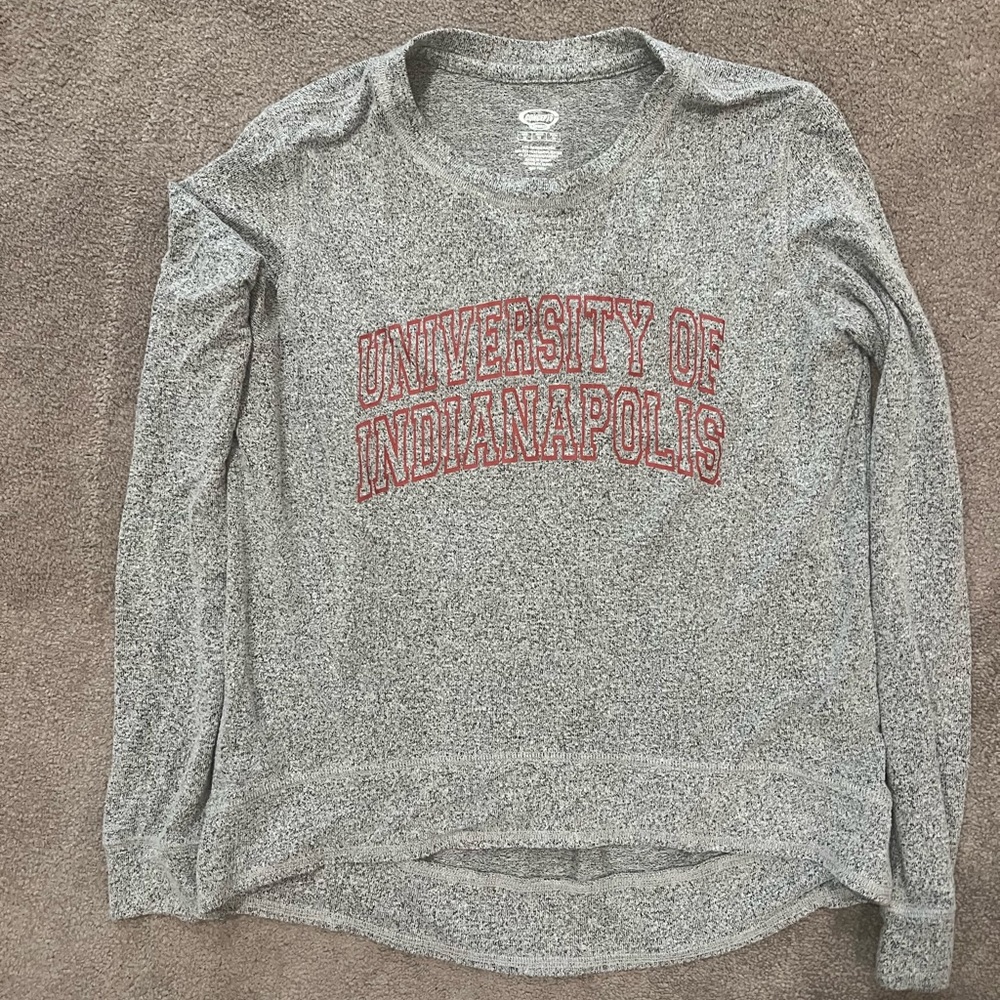 Grey high-low long sleeve T-shirt with University of Indianapolis logo